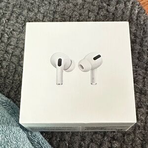 Empty Apple AirPods Pro with White MagSafe Case